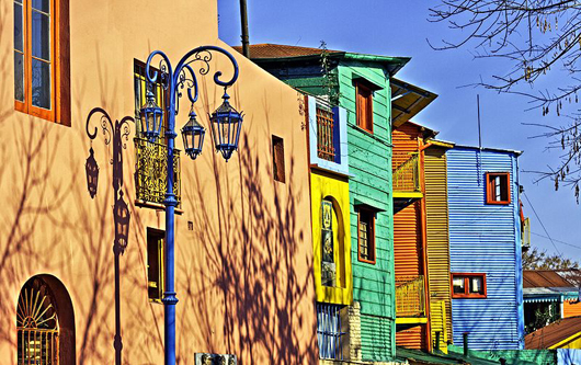 Buenos Aires is a city of color and artistry, as evidenced by this picture of Caminito (Little Way) in the neighborhood known as La Boca (Mouth). July 16, 2008 photo by Luis Argerich, licensed under the Creative Commons Attribution 2.0 Generic license.